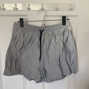 Shiny silver shorts perfect for music festival
